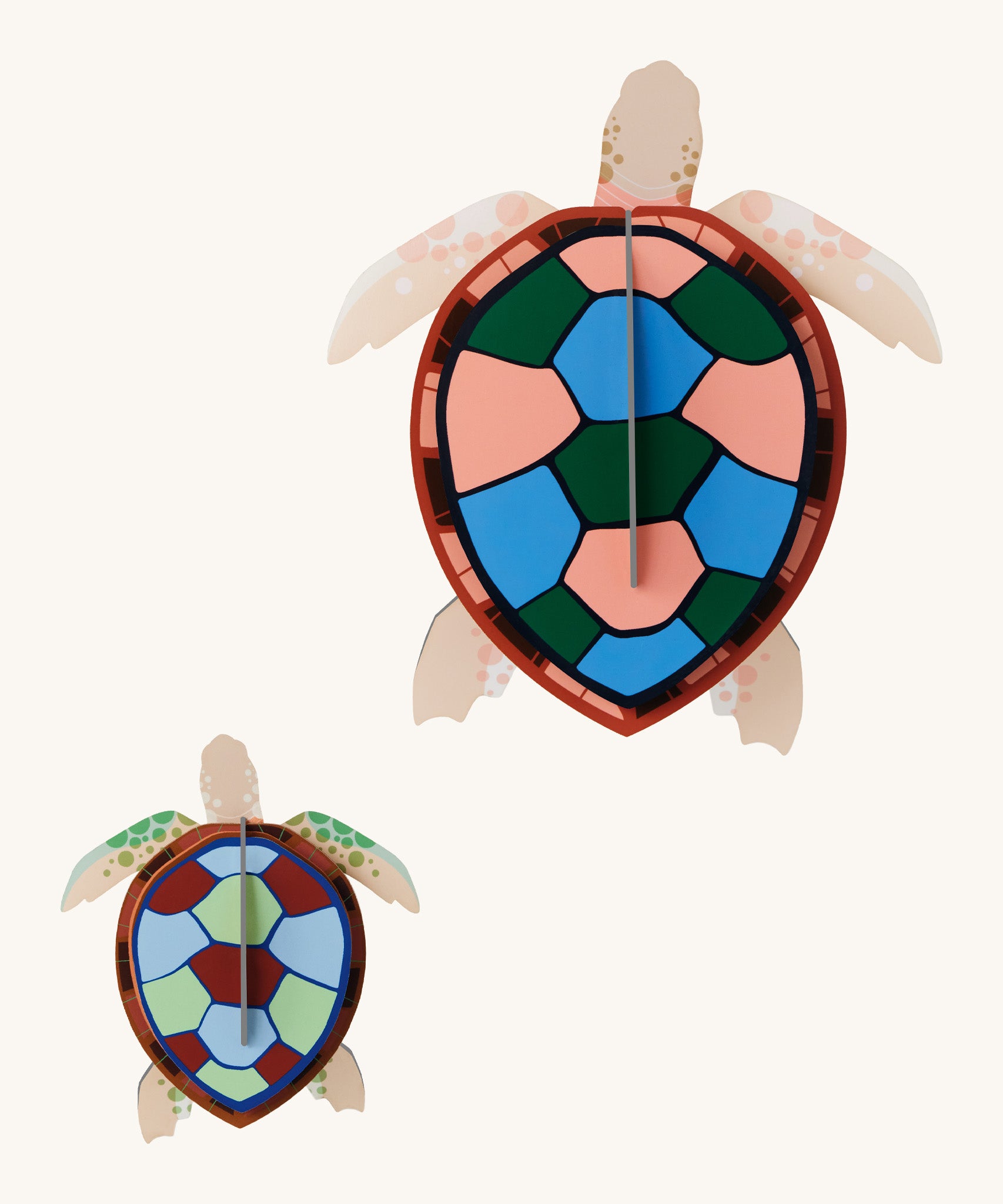 Studio Roof sea turtles wall decoration available at Babipur. Features a thick cardboard DIY kit of an adult and baby sea turtle to hang on a wall