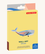 The cardboard packaging for the whale wall decoration available at Babipur.