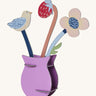 Studio Roof Cardboard Pop Out Card - William Morris Flowers on a cream background. The image shows a constructed 3D cardboard vase with a cardboard pop out flower, strawberry and bird inside the vase