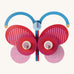 A bright and retro style stripy butterfly wall decoration available at Babipur. A Studio roof collaboration with artist Zoe Miller. 