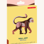 Studio Roof Monkey - 3D Cardboard model in its colourful packaging.