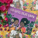 The Gifts That Grow children's book written by Monika Singh Gangotra and illustrated by Michaela Dias-Hayes, cover shows two girls next to Jamun plant trees.