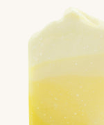 A close up of the The Soapmine snow bucks fizz bar available at Babipur showing the orange/yellow gradient detail