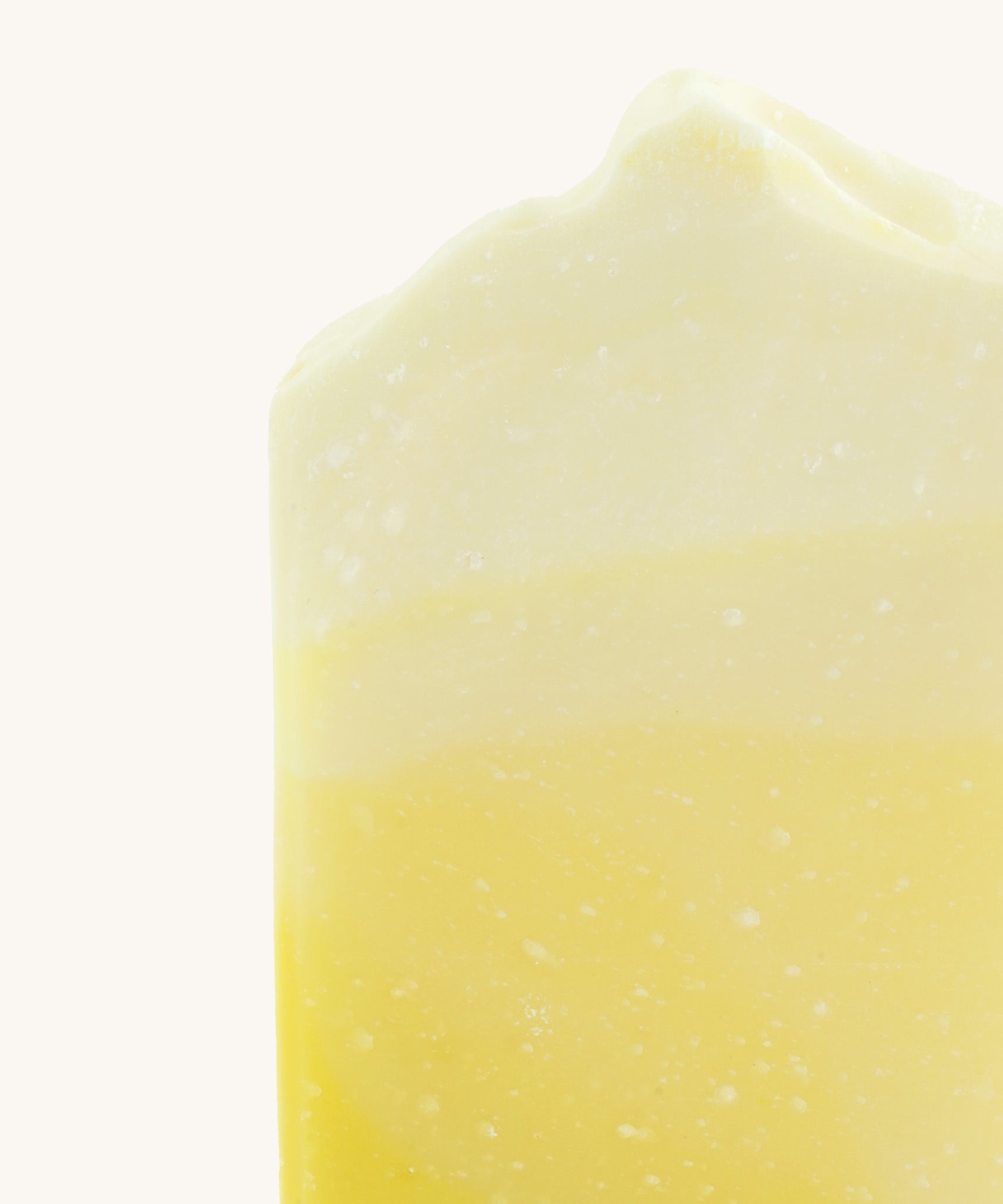 A close up of the The Soapmine snow bucks fizz bar available at Babipur showing the orange/yellow gradient detail