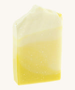 The Soapmine bucks fizz bar. A Christmas inspired Handmade soap available at Babipur with champagne and citrus orange notes. Soap bar has a yellow/orange gradient look