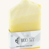 The Soapmine bucks fizz bar. A Christmas inspired Handmade soap available at Babipur notes of champagne and citrus orange. Comes with branding paper strip. 