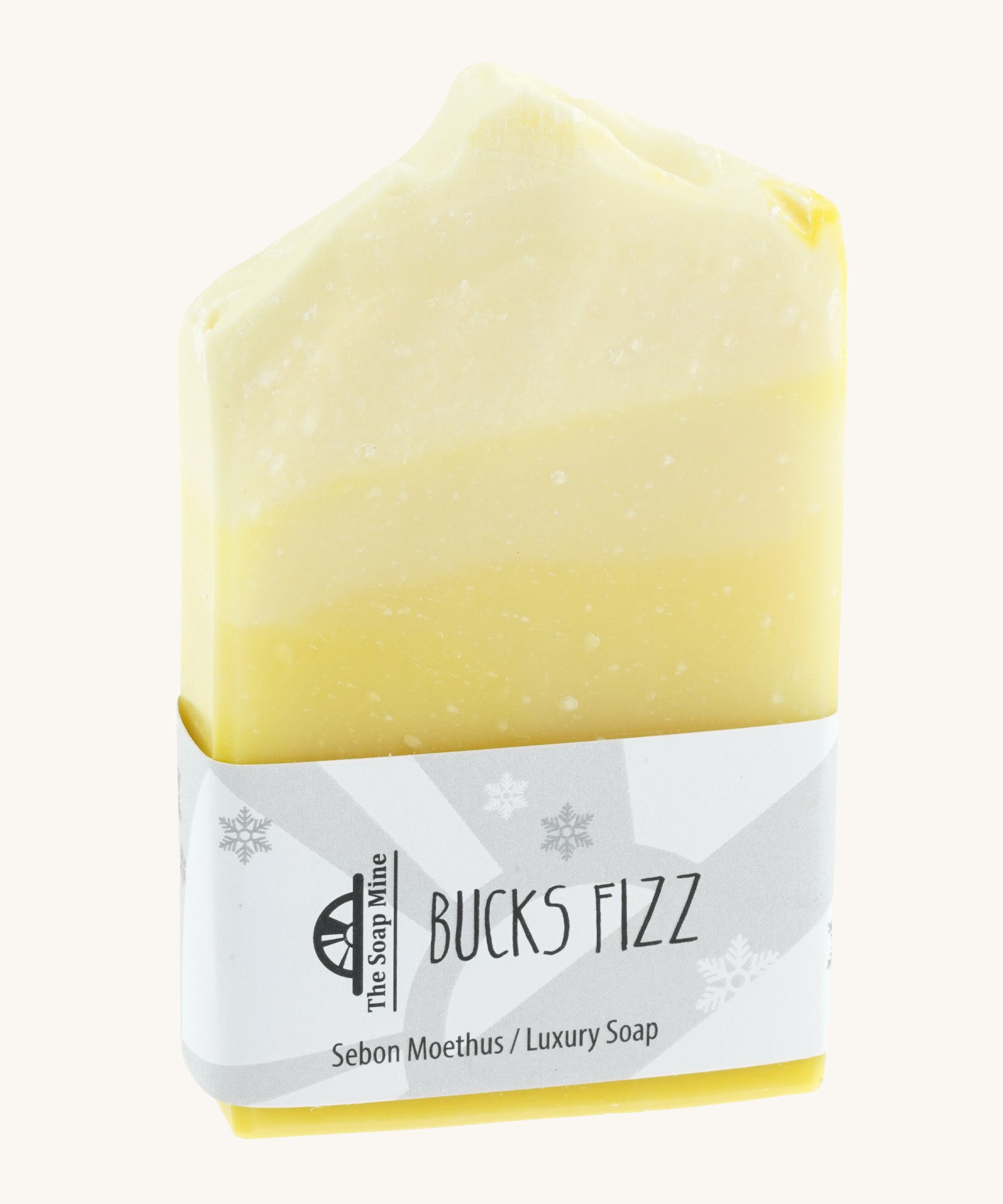 The Soapmine bucks fizz bar. A Christmas inspired Handmade soap available at Babipur notes of champagne and citrus orange. Comes with branding paper strip. 