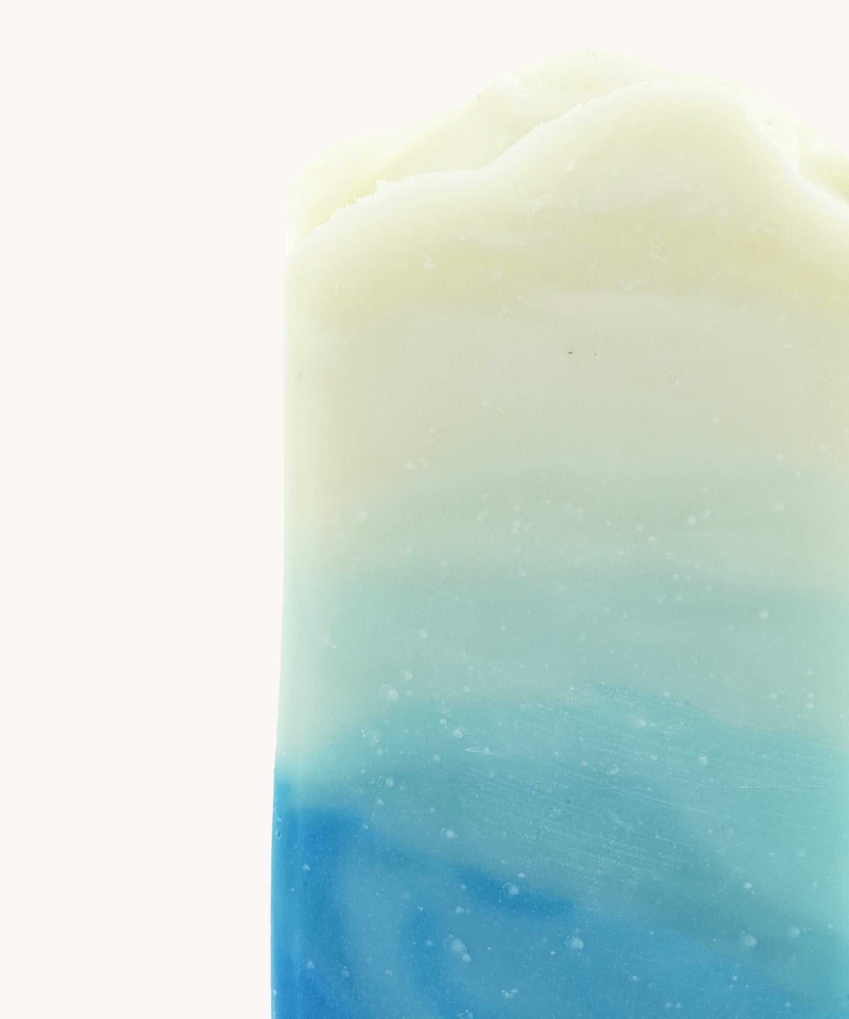 A close up of the The Soapmine snow fairy bar available at Babipur showing the blue gradient detail