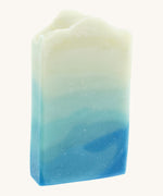 The Soapmine snow fairy bar. A Christmas inspired Handmade soap available at Babipur with rose, raspberry and musky notes. Soap bar has a blue wavy gradient look