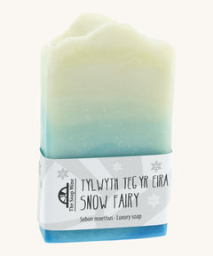 The Soapmine snow fairy bar. A Christmas inspired Handmade soap available at Babipur with rose, raspberry and musky notes. Comes with branding paper strip. 