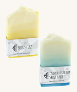 The Soapmine snow fairy bar and bucks fizz bars. Christmas inspired Handmade soap available at Babipur with natural essential oils. Comes with branding paper strip. 