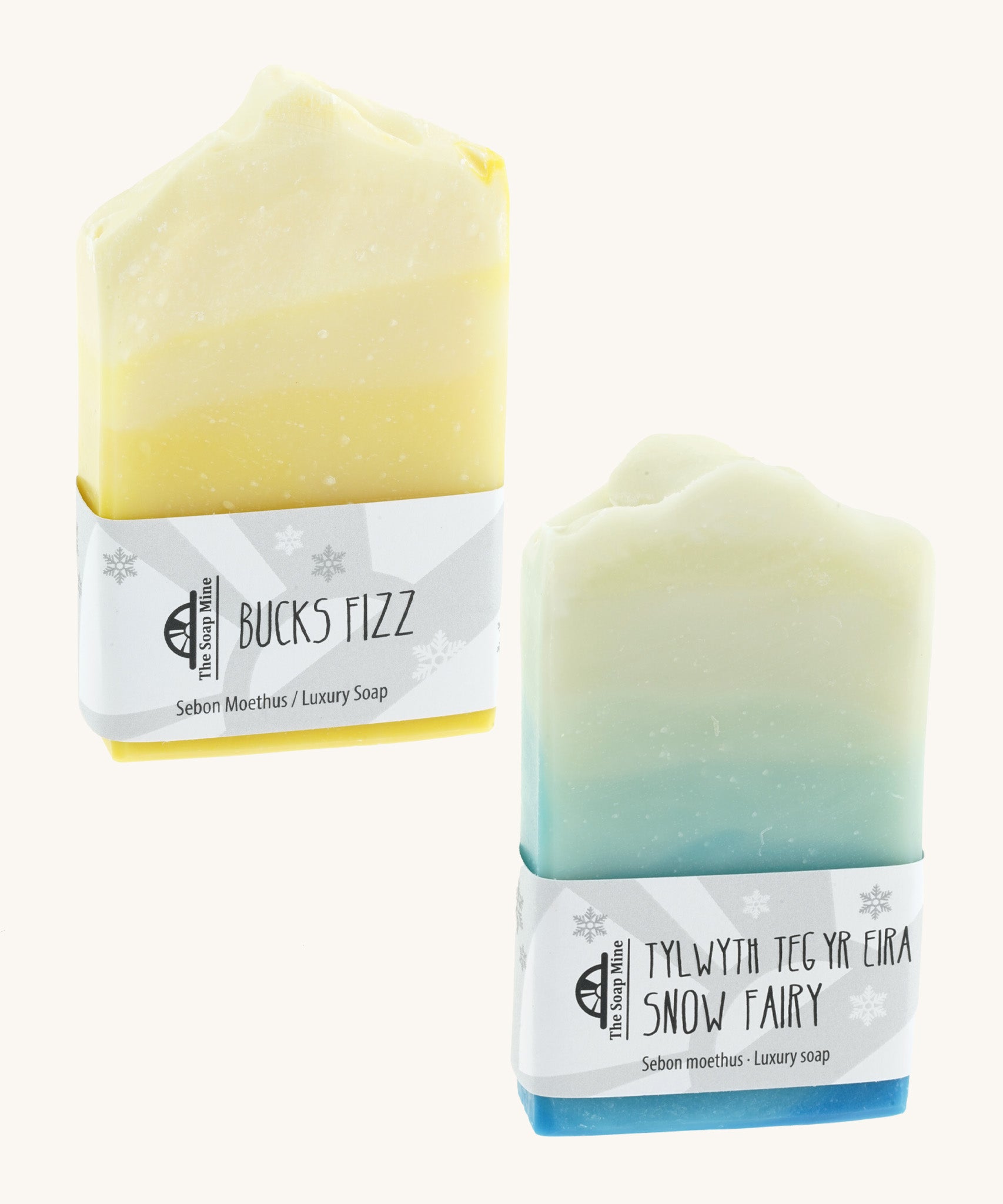 The Soapmine snow fairy bar and bucks fizz bars. Christmas inspired Handmade soap available at Babipur with natural essential oils. Comes with branding paper strip. 