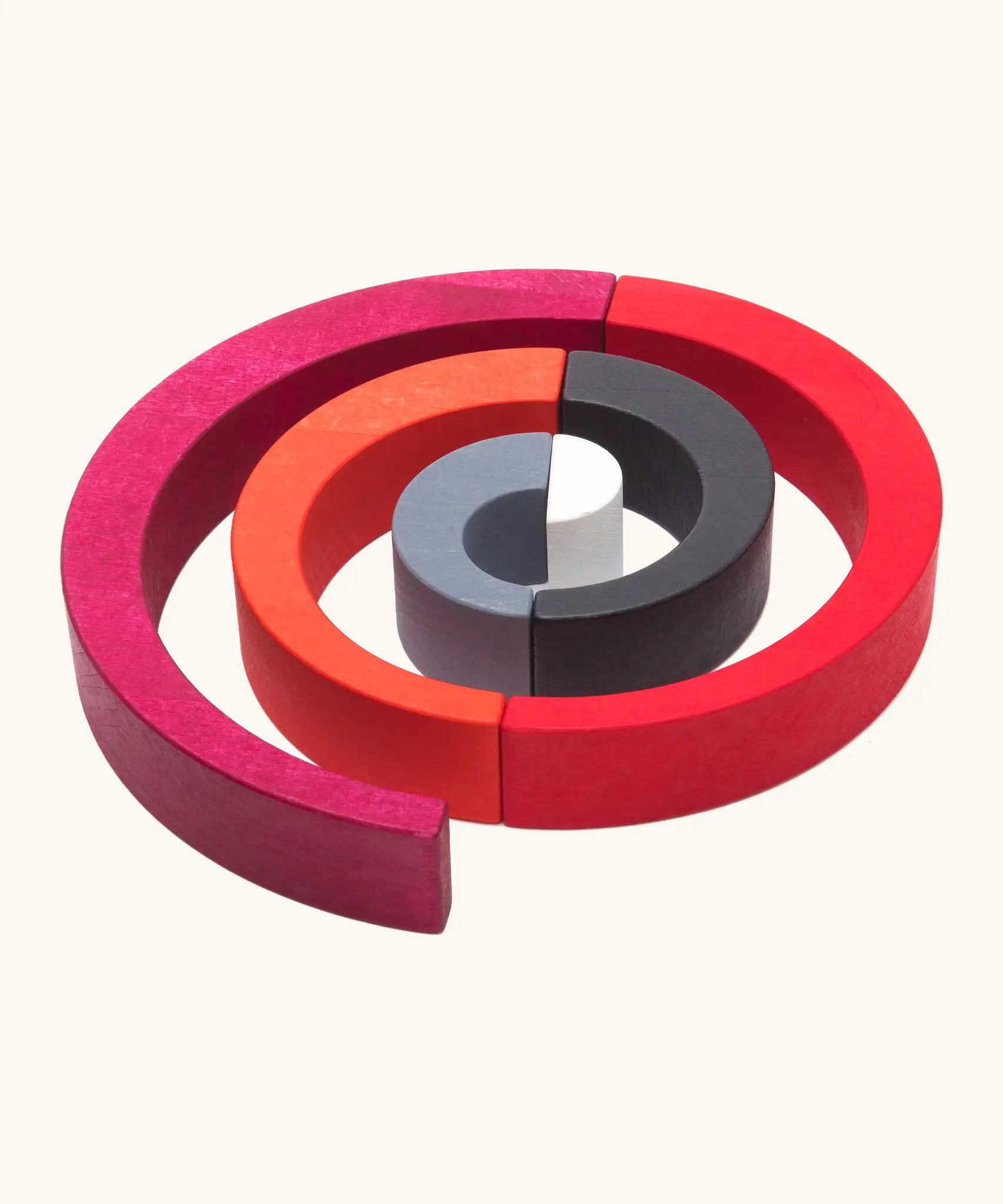 A swirl structure made from Tobe wooden asymmetrical arches could be used as a ball run