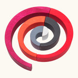 A swirl structure made from Tobe wooden asymmetrical arch pieces 