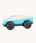 Tobe Poly Car in light blue and black, on a cream background. The car is made from wood in a geometric shape to give a futuristic feel.