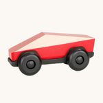Tobe Poly Car in red and black, on a cream background. The car is made from wood in a geometric shape to give a futuristic feel.