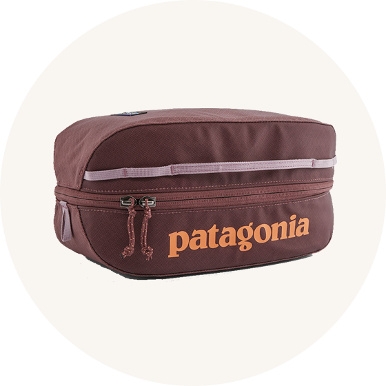 Patagonia travel cube on cream background to represent toiletry and wet bags at Babipur.