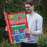 A person holding the Tony's Chocolonely Fairtrade Advent Calendar, looking inside at the delicious chocolates