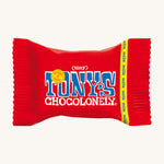 The Tony's Chocolonely Tiny Chocolate in its red wrapper, on a cream background
