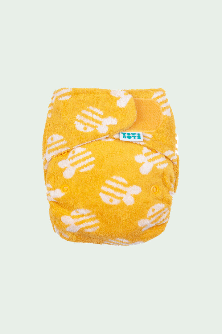 Tots Bots Reusable Bamboozle Nappy - yellow bumblebee print - an absorbent bamboo insert to be worn with a wrap.