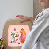 Toverlux colouring silhouette book by Daniela Dreschers available at Babipur and showing a silhouette of a cat and goblin   