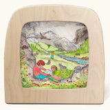 Toverlux Edulux watercycles silhouette featuring Stephanie Green's Mountains artwork. The silhouette is shown in a wooden frame. 