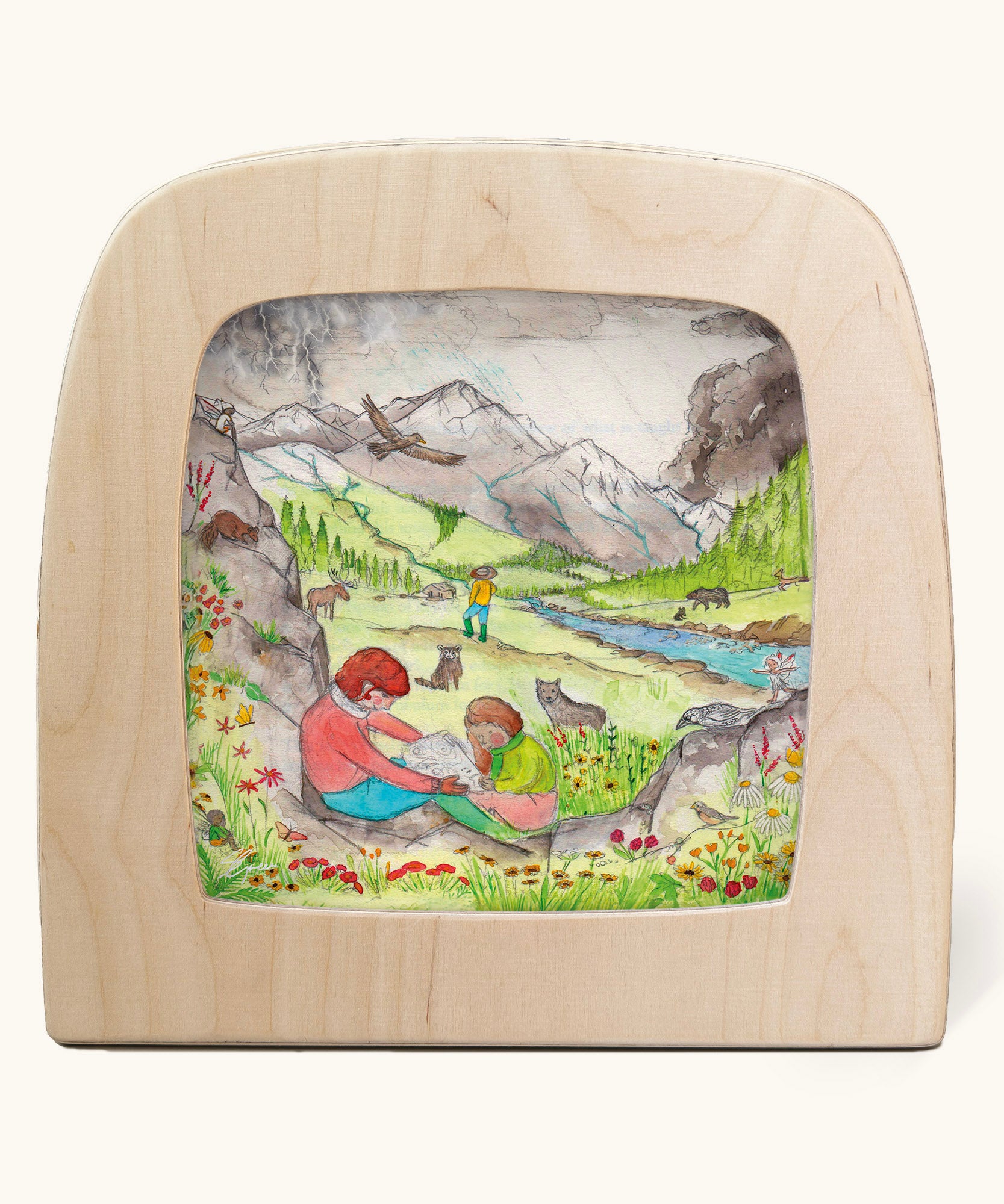 Toverlux Edulux watercycles silhouette featuring Stephanie Green's Mountains artwork. The silhouette is shown in a wooden frame. 