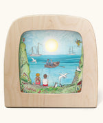 Toverlux Edulux watercycles silhouette featuring Stephanie Green's Ocean artwork. The silhouette is shown in a wooden frame. 