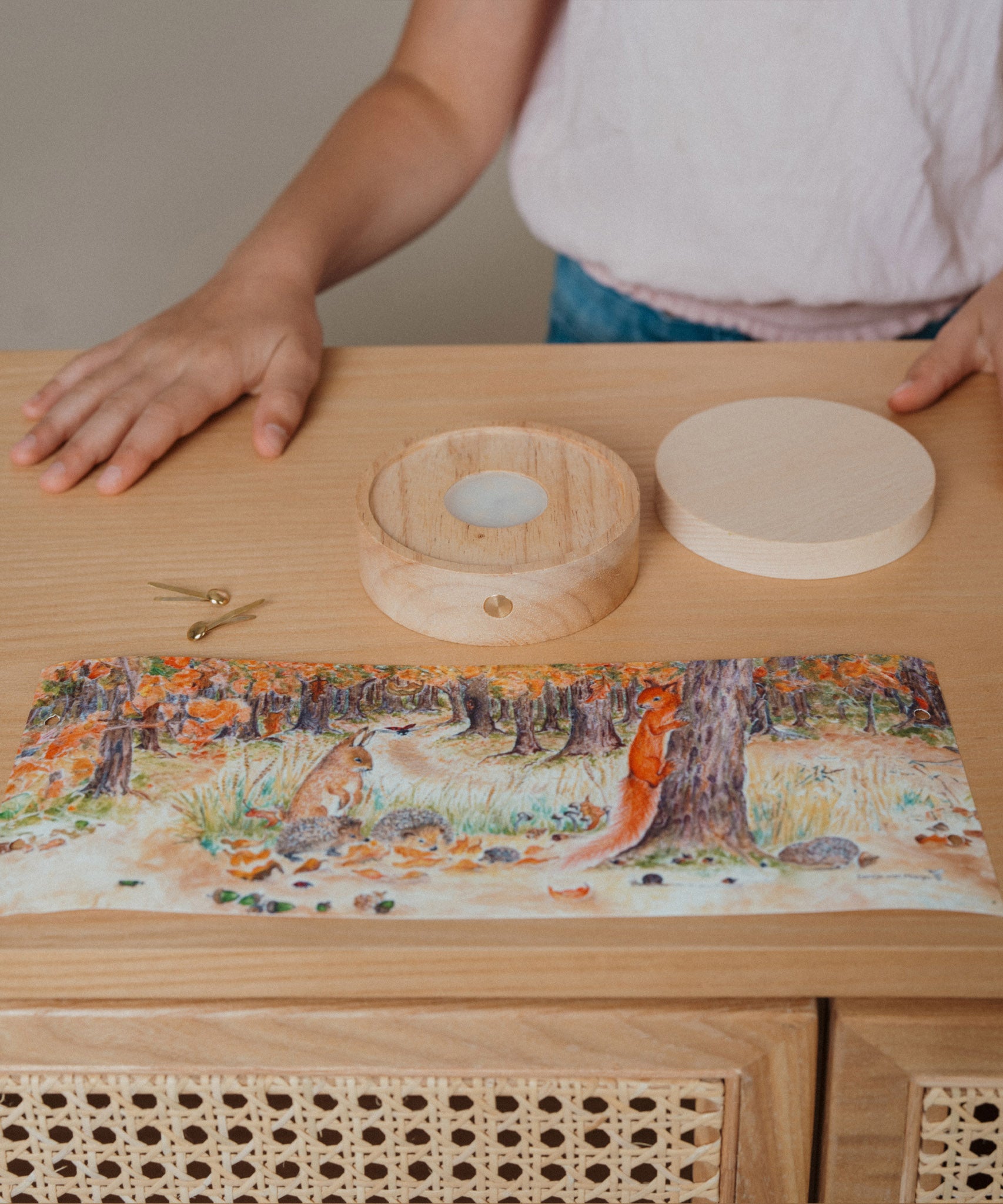A flatlay including the base and lid for the Toverlux rechargeable lantern and illustration ready for assembly. Both available at Babipur.