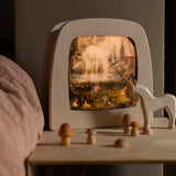 Toverlux Magic Lamp with unicorn artwork by Mhairi Hellbrandt, Ostheimer wooden unicorn figure and Grapat toy mushrooms.