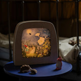 Toverlux Magic Lamp with full moon artwork by Mhairi Hellbrandt with Ostheimer dwarf and hedgehogs.