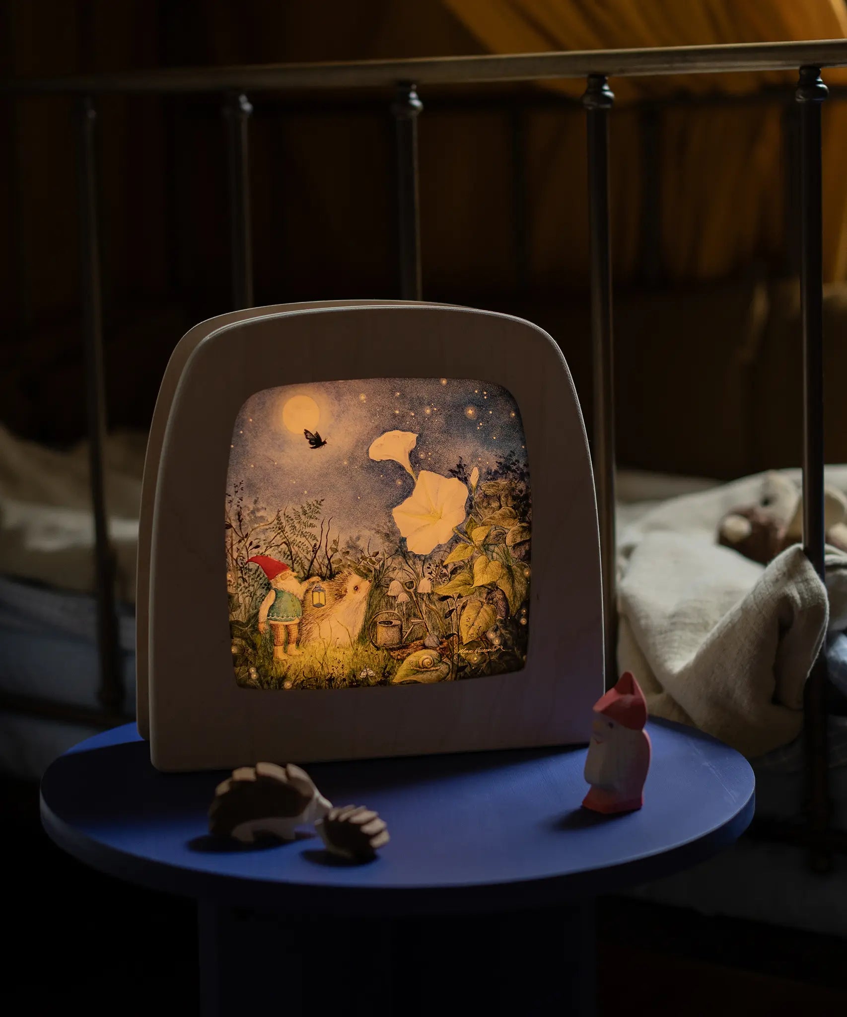 Toverlux Magic Lamp with full moon artwork by Mhairi Hellbrandt with Ostheimer dwarf and hedgehogs.