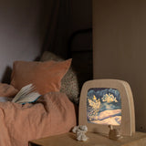 Toverlux Magic Lamp with ice queen swan artwork by Mhairi Hellbrandt in bedroom setting with Ostheimer swan.