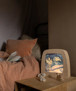 Toverlux Magic Lamp with ice queen swan artwork by Mhairi Hellbrandt in bedroom setting with Ostheimer swan.