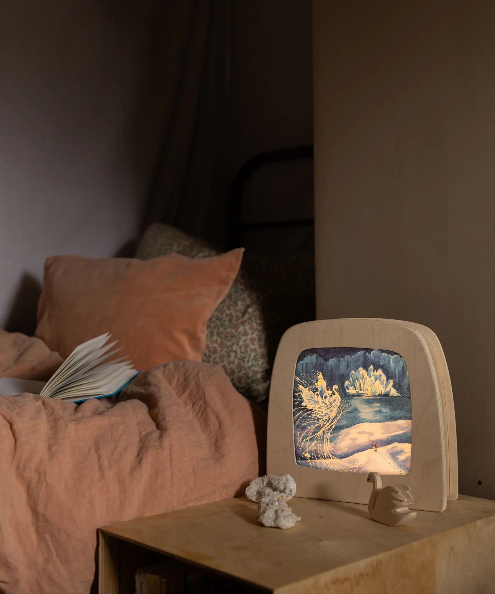 Toverlux Magic Lamp with ice queen swan artwork by Mhairi Hellbrandt in bedroom setting with Ostheimer swan.