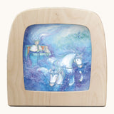 Toverlux ice queen silhouette by Anne illustrates that fit in a wooden magic lamp. Shows water colour style of a ice queen in a horse carriage.