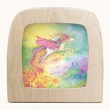 Toverlux unicorn dream silhouette by Anne illustrates that fit in a wooden magic lamp. Shows watercolour style of a flying unicorn 
