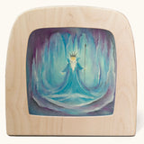 A Toverlux silhouette in the magic lamp withWinter ice king artwork by Baukje Exler. A pastel illustration of a ice king surrounded by icicles.