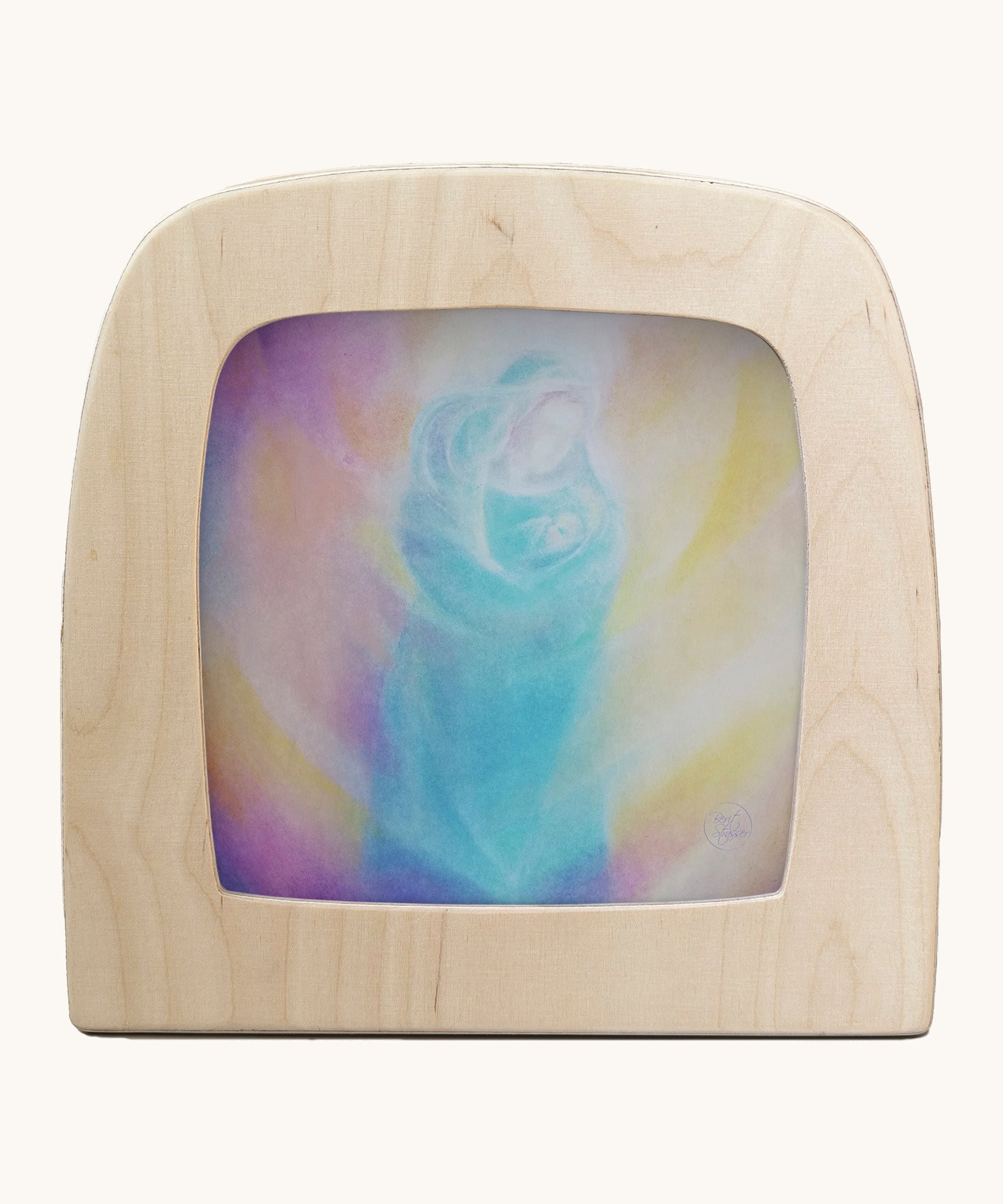 Toverlux light silhouette by Berit Strasser a oil pastel style of mother holding a child. Shows silhouette in a wooden frame