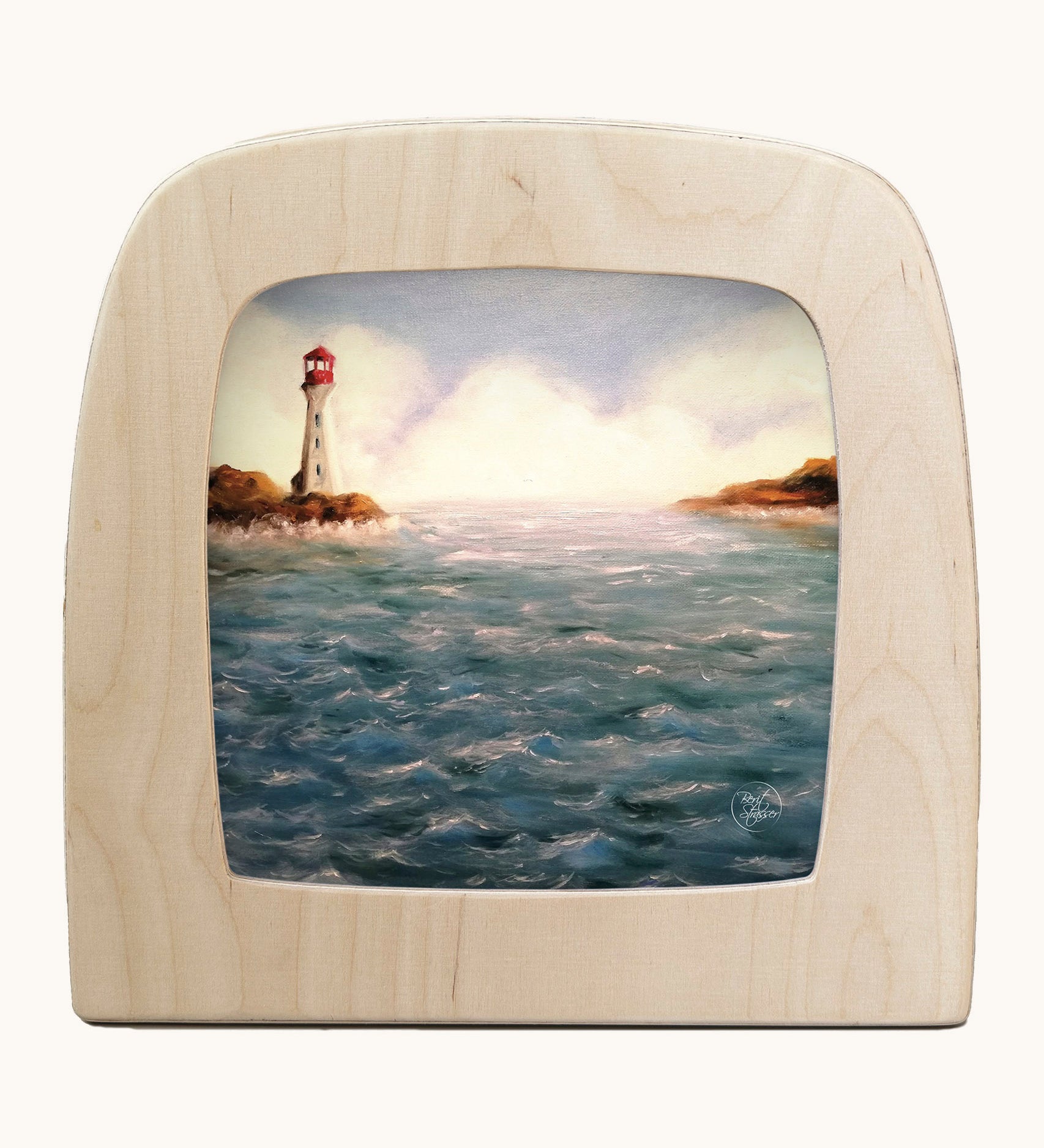 Toverlux lighthouse silhouette by Berit Strasser a oil pastel style of a lighthouse and the ocean. Shows silhouette in a wooden frame