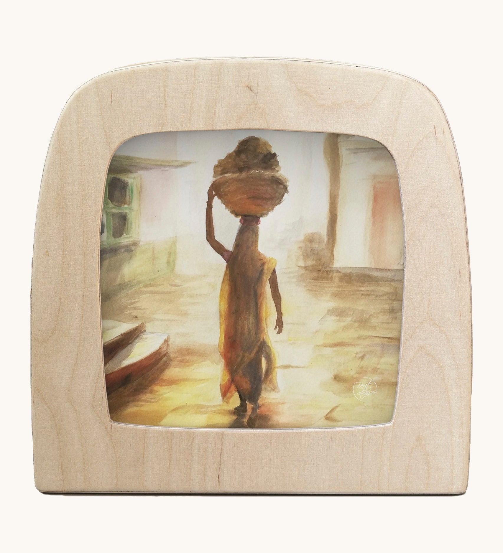 Toverlux morning light silhouette by Berit Strasser a oil pastel style of a woman holding a basket on her head. Shows silhouette in a wooden frame