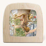 Toverlux children of the forest hide and seek silhouette by Elsa Beskow available at Babipur. The image shows the a illustration of woodland fairytale animals and characters hiding in a tree