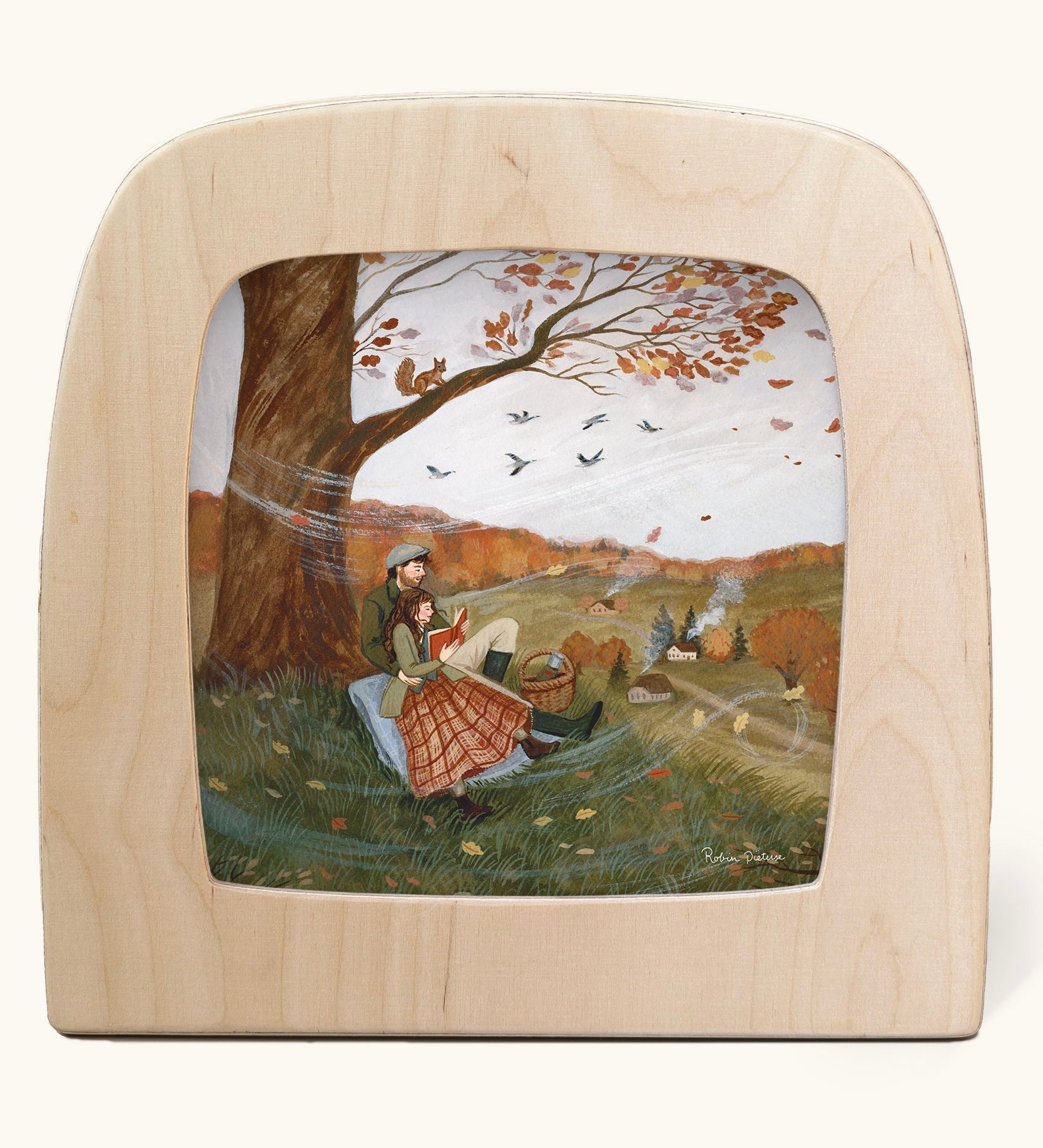 Autumn Lovers Picnic Toverlux Magic Lamp Silhouette. Artwork By Robin-Pieterse. A delicate painting style illustration of 2 people sitting underneath a tree. One of them is reading a book. A range of Toverlux silhouettes, lamp and accessories are available at Babipur.
