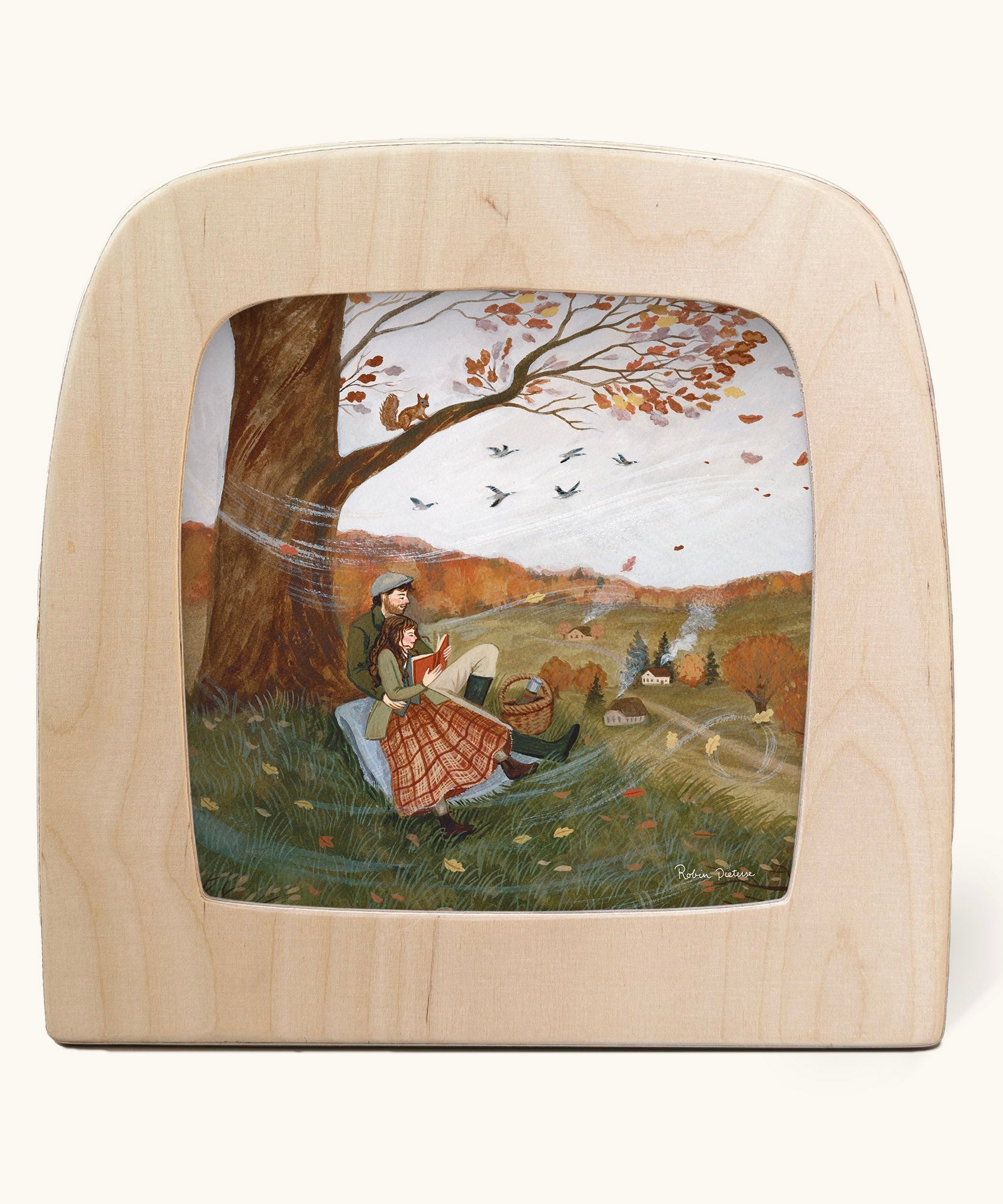 Autumn Lovers Picnic Toverlux Magic Lamp Silhouette. Artwork By Robin-Pieterse. A delicate painting style illustration of 2 people sitting underneath a tree. One of them is reading a book. A range of Toverlux silhouettes, lamp and accessories are available at Babipur.