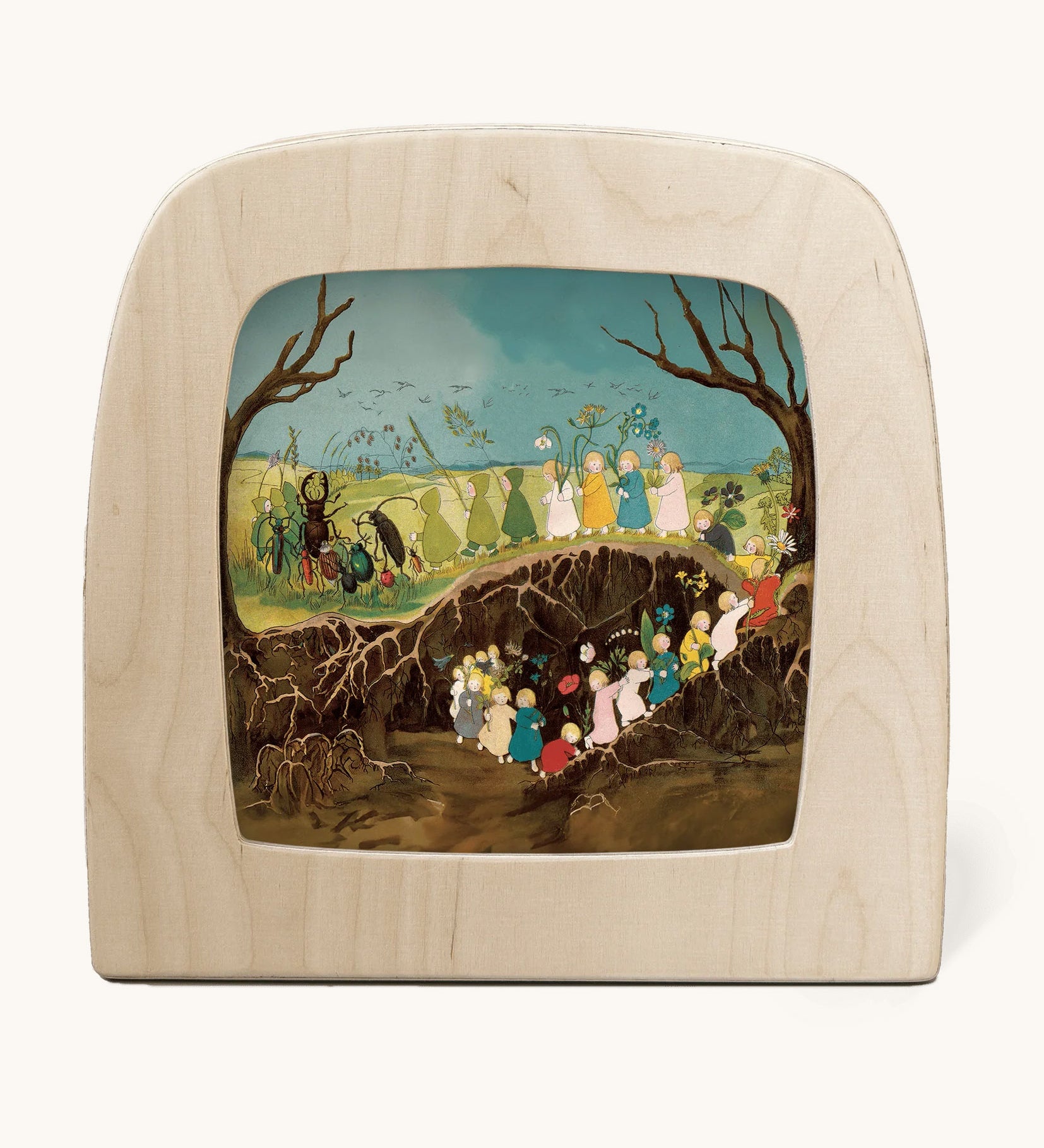 Toverlux magic lamp with a Sibylle Von Olfer spring silhouette inside, both available at Babipur. Illustration showing a group of children carrying flowers underground and above ground.