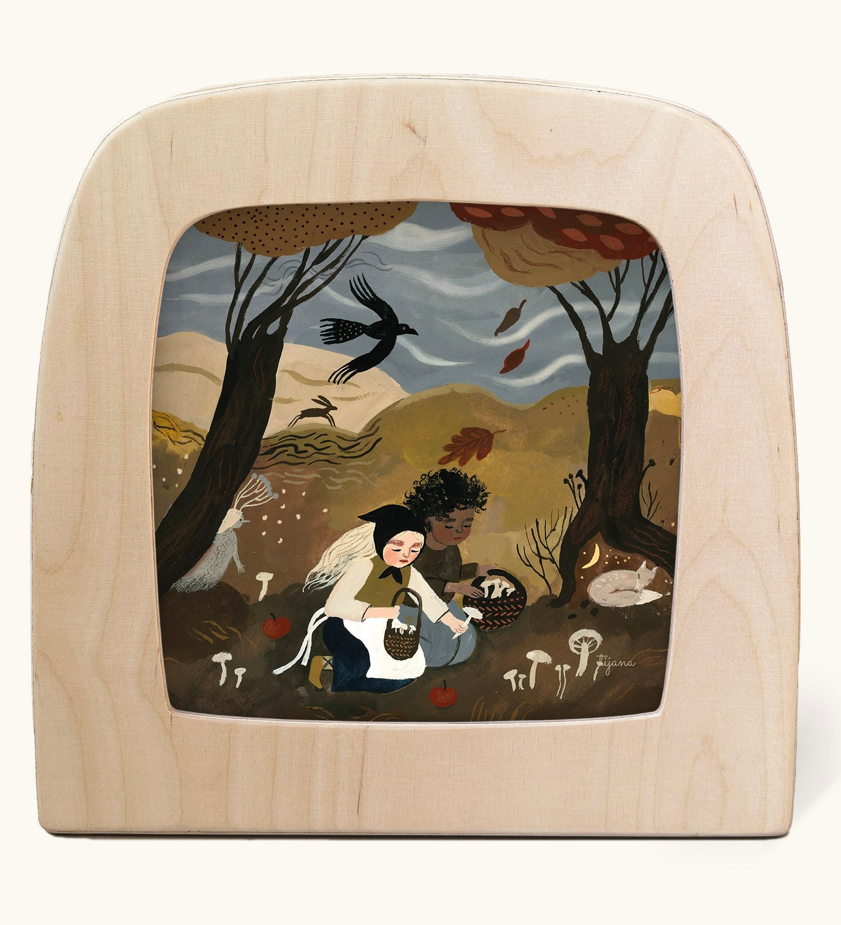 Toverlux Magic Lamp Silhouette Illustration Autumn Treasures by Tijana Draws. The artwork features two people kneeling down in a forest scene foraging mushrooms. We have a range of Toverlux silhouettes, lamps and accessories available at Babipur.