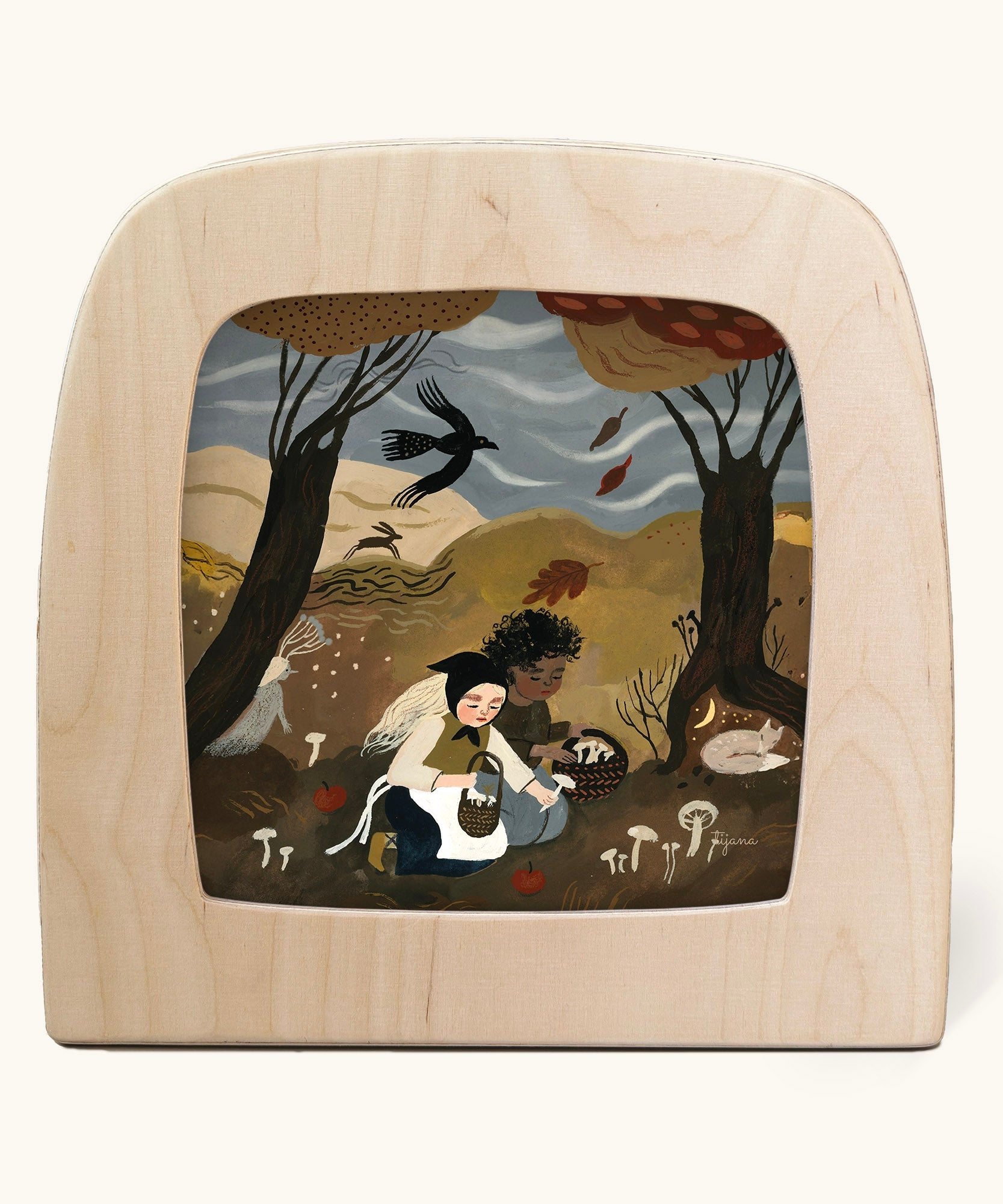 Toverlux Magic Lamp Silhouette Illustration Autumn Treasures by Tijana Draws. The artwork features two people kneeling down in a forest scene foraging mushrooms. We have a range of Toverlux silhouettes, lamps and accessories available at Babipur.
