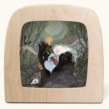 Toverlux Magic Lamp Silhouette Illustration Forest Nymph by Tijana Draws. The artwork features female nature spirit in a trunk of a tree with a forest animal. We have a range of Toverlux silhouettes, lamps and accessories available at Babipur.