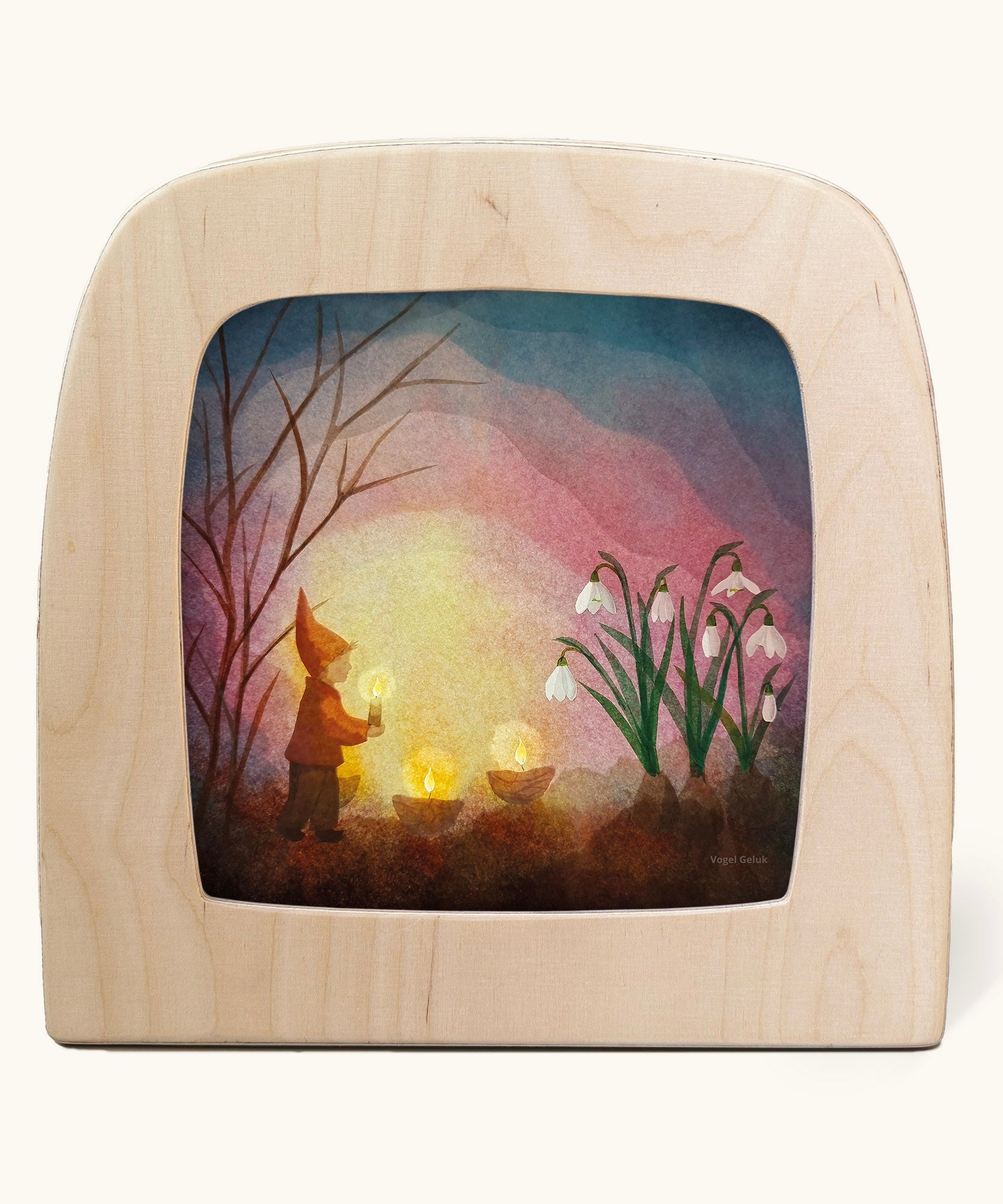 Toverlux magic lamp with a kinding spring snowdrop gnome silhouette by artist Vogel Geluk. A watercolour style illustration of a gnome carrying a lit candle walking towards a bunch of snowdrops. A range of Toverlux silhouettes, lamps and accessories are available at Babipur. 