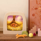 Toverlux Magic Wooden Lamp with artwork of a fox in a forest by by Bauke Exler in a room detting next to an Ostheimer running fox.